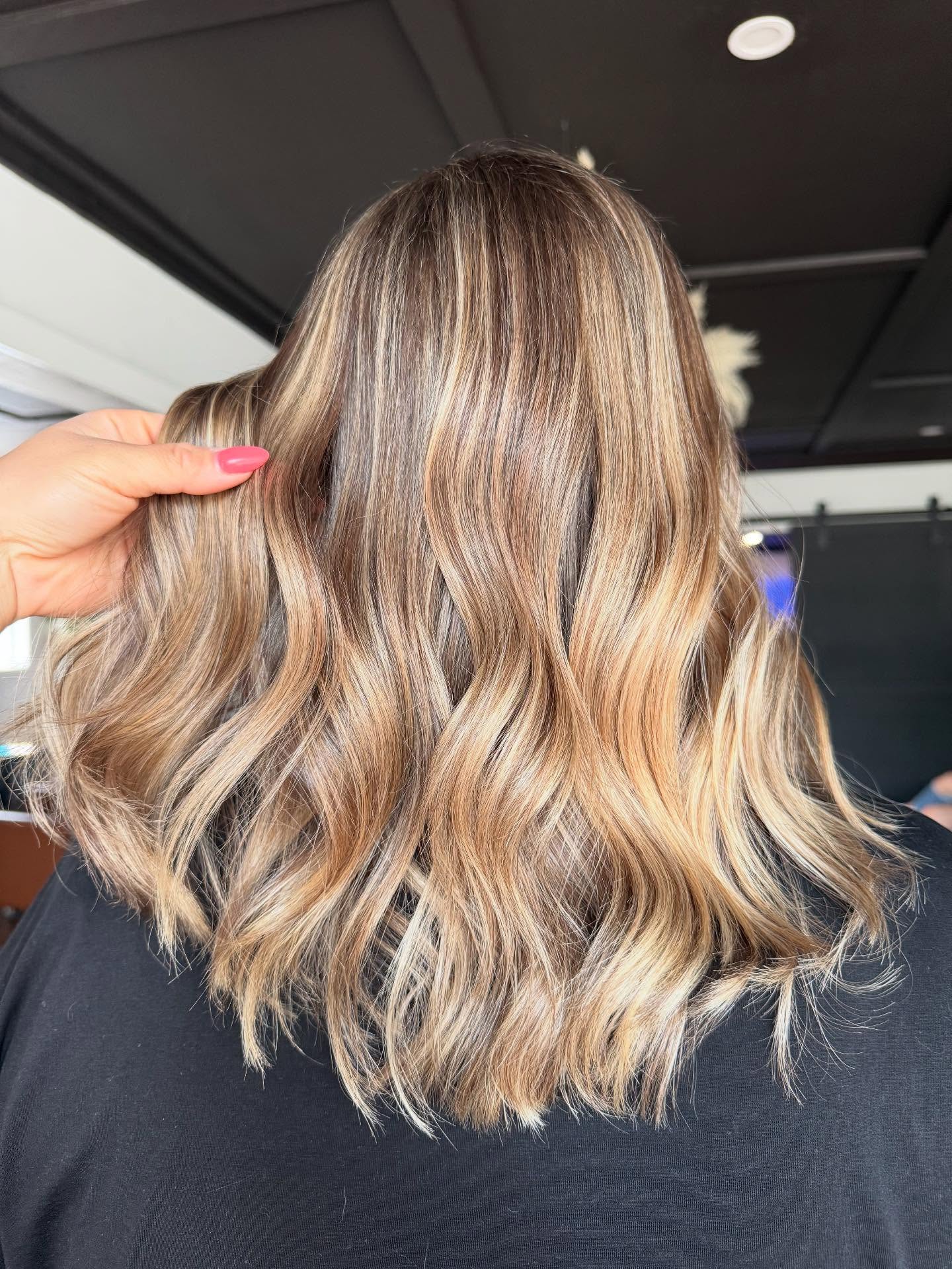 Hair styling result at A Blonde And A Brunette